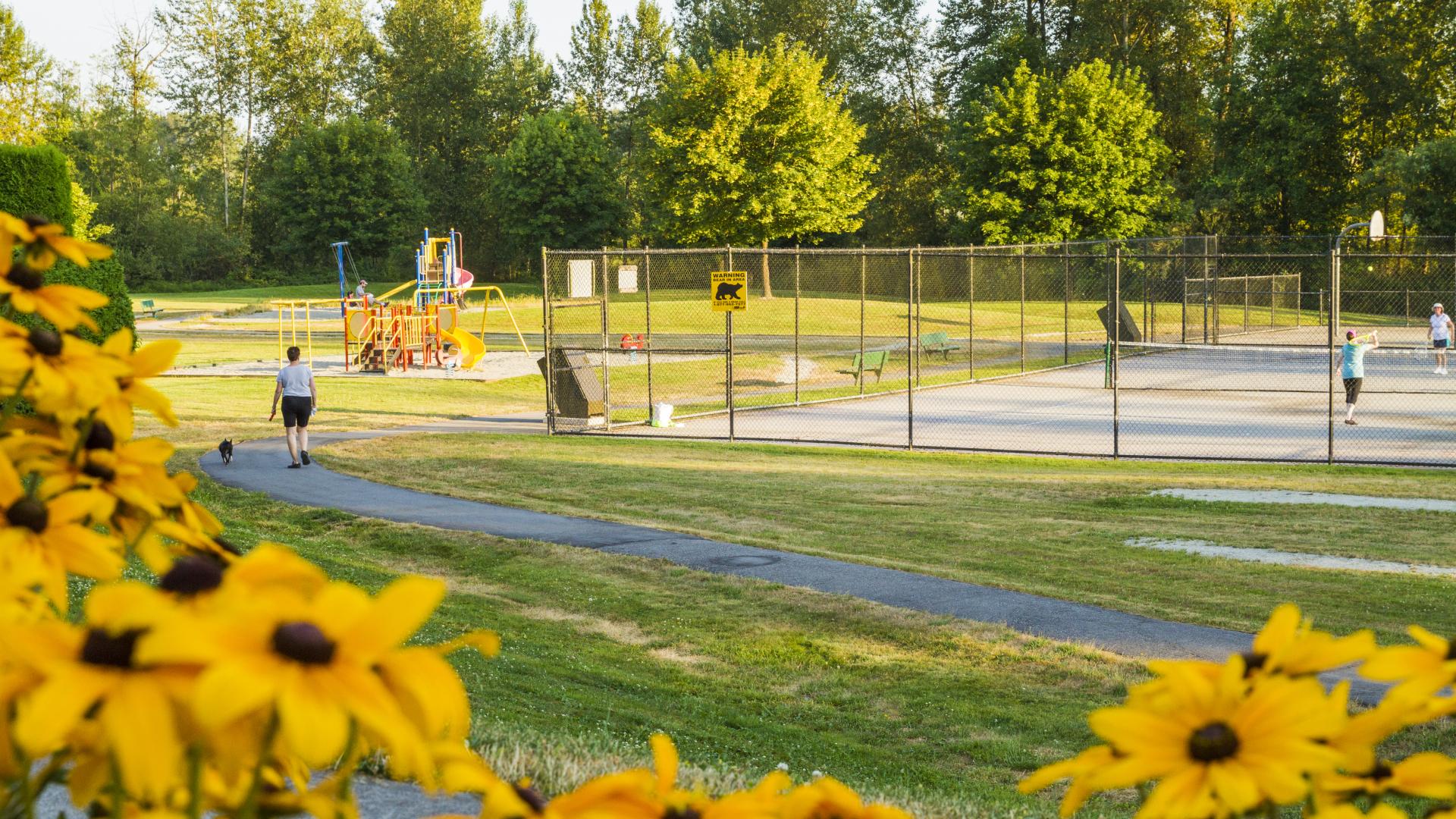 A pathway the Belle Morse Park's basketball court.